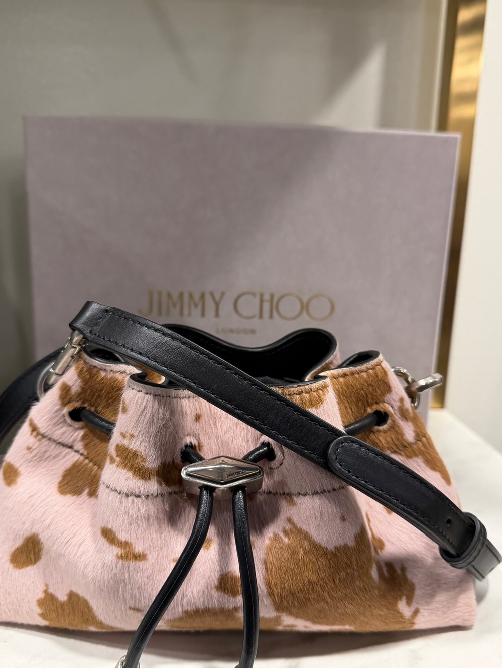 Brand new Jimmy Choo Cinch Cow-Print Small  Bon Bon Drawstring Crossbody Bag